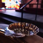 stainless steel round bowl on table