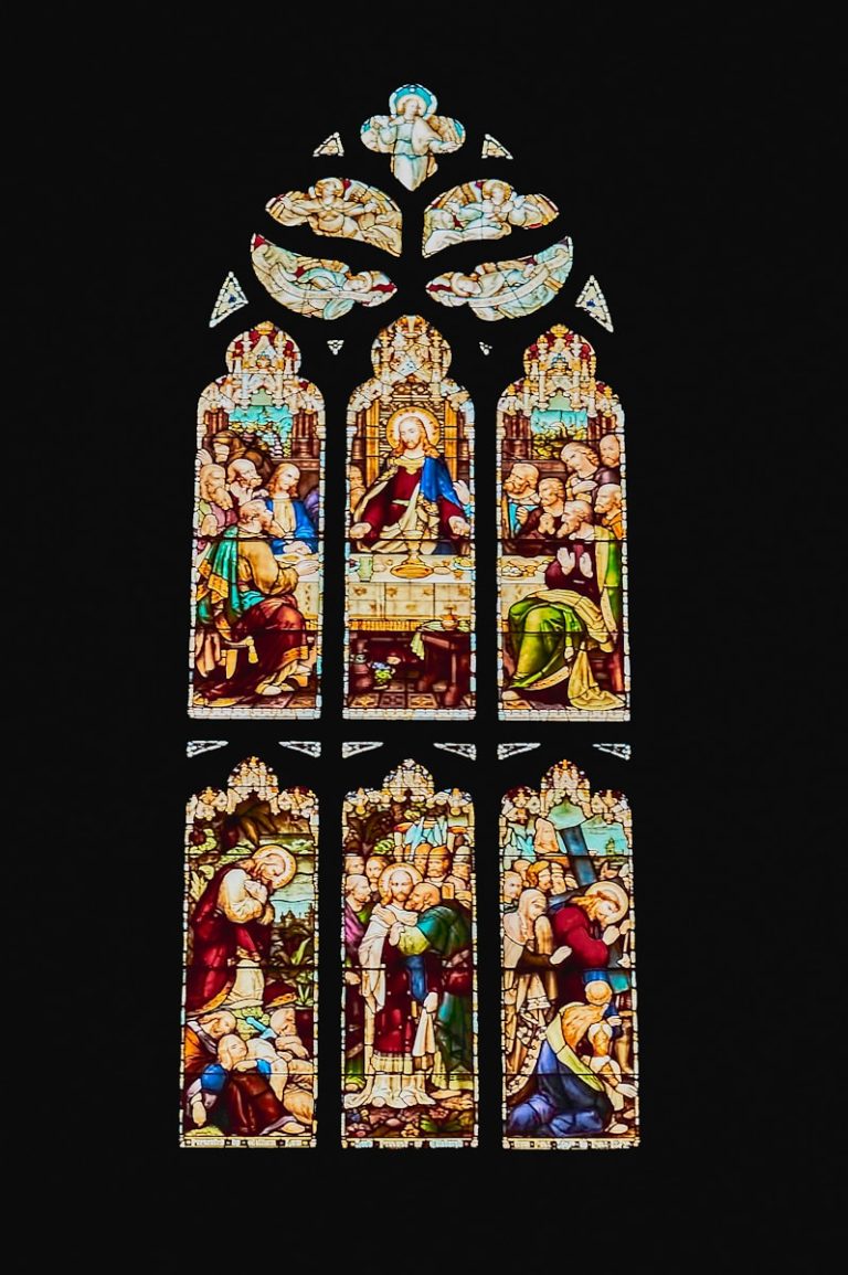 a stained glass window depicting the birth of jesus